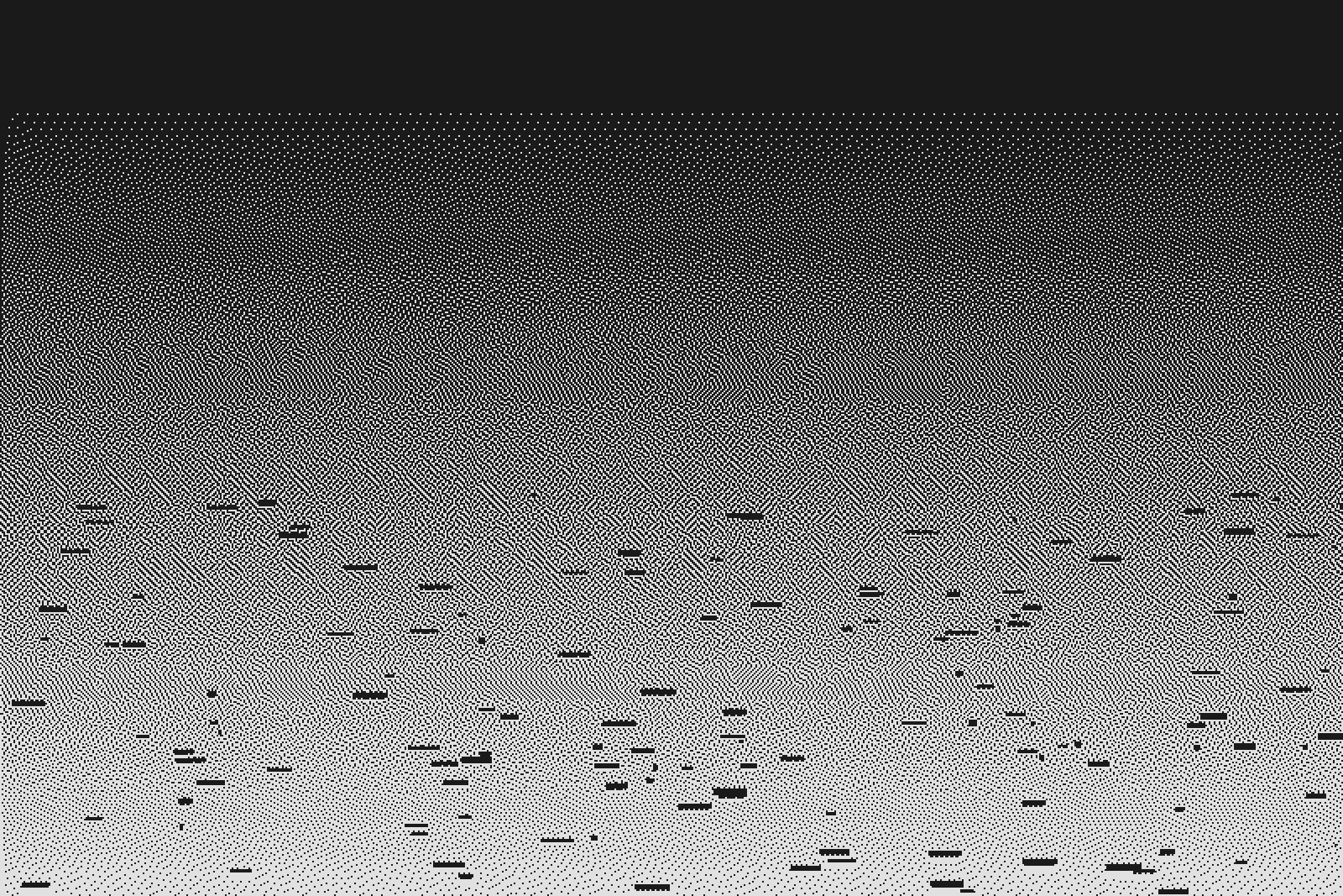 Amber sky low over dark rooftops